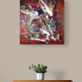 Évadez-vous avec un tableau abstrait aux couleurs vives et décorez votre salon grâce à cette peinture abstraite sur fond rouge.